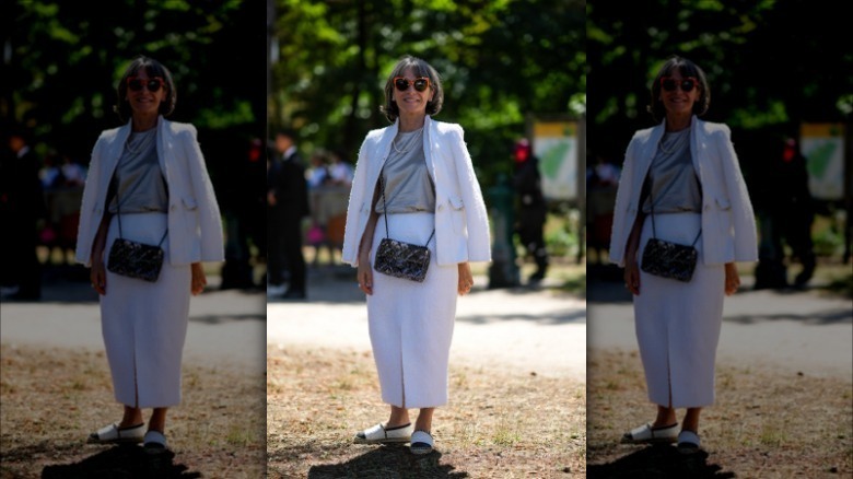 Woman wearing white, espadrille loafers