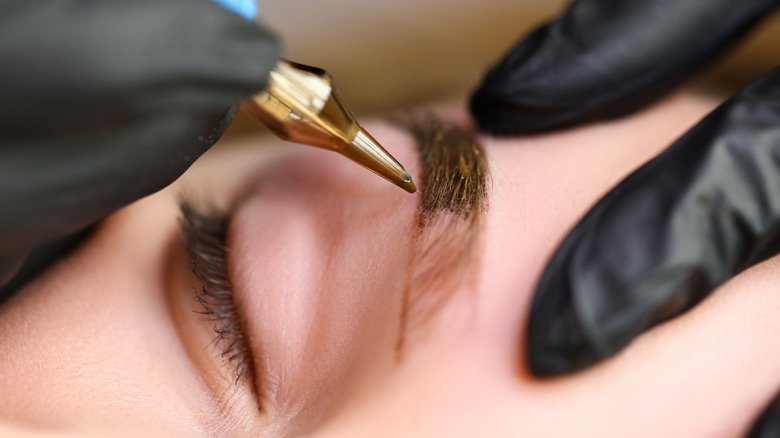 woman getting microblading