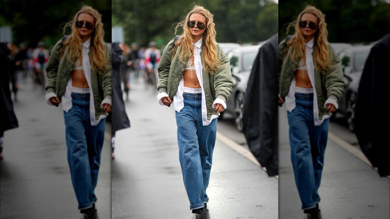 Woman wearing medium wash jeans 