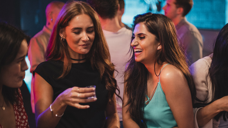 Female friends drinking