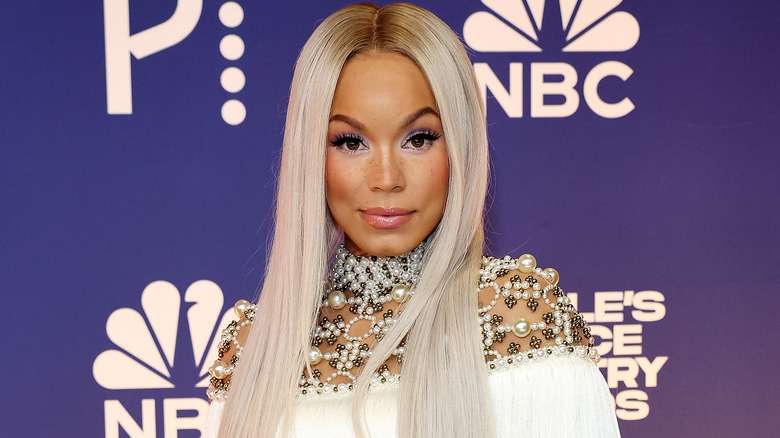 Tanner Adell in a fringed and beaded dress at the 2024 People's Choice Country Awards.