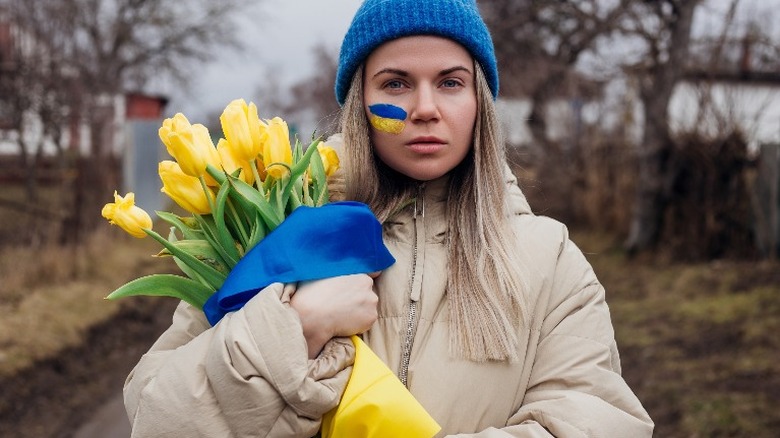 lonely woman with flowers