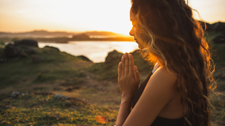 Woman meditating in nature