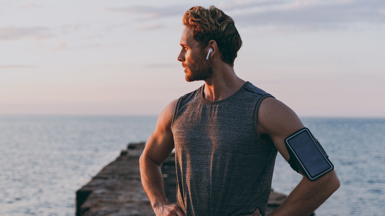 Strong man on a pier 