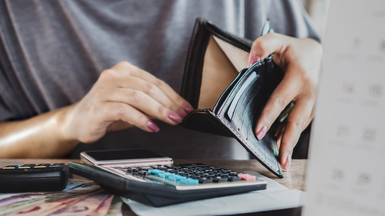 woman with empty wallet