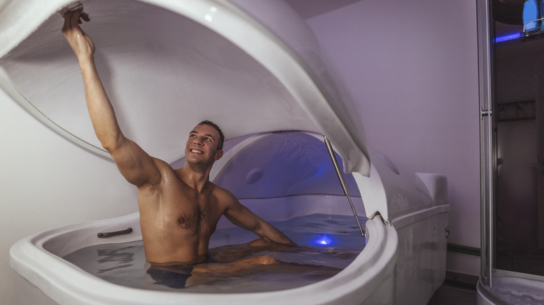 Man closing a float tank