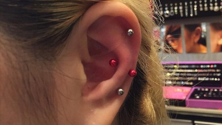 red barbell antihelix piercing