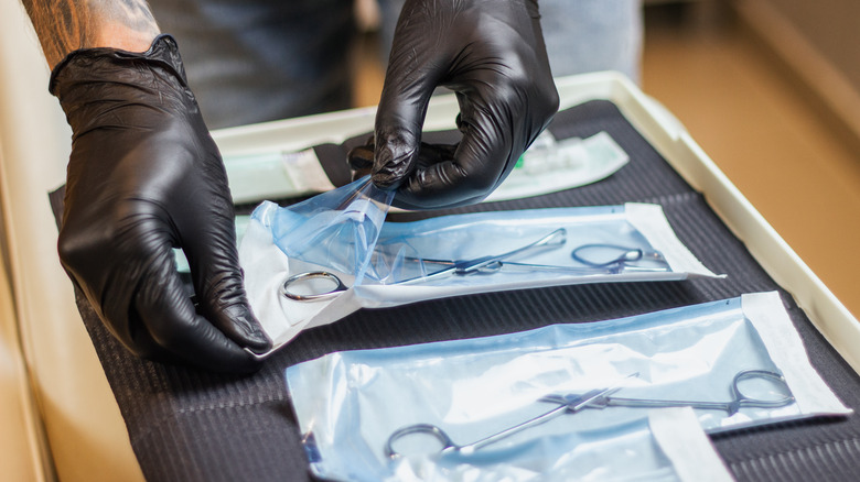 piercer preparing sterile piercing equipment