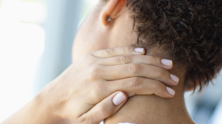 woman with neck pain