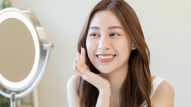 Smiling woman with very fair skin