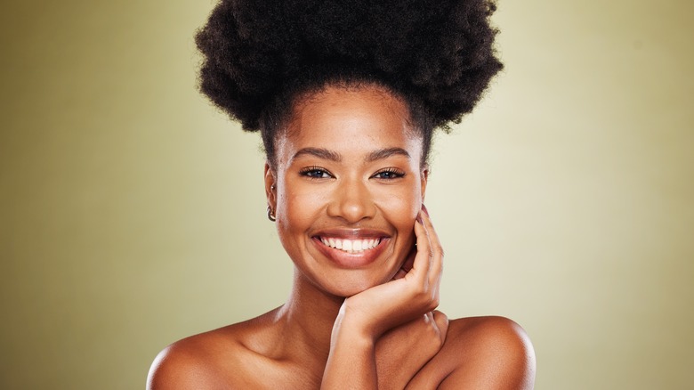 Smiling woman with glowing skin