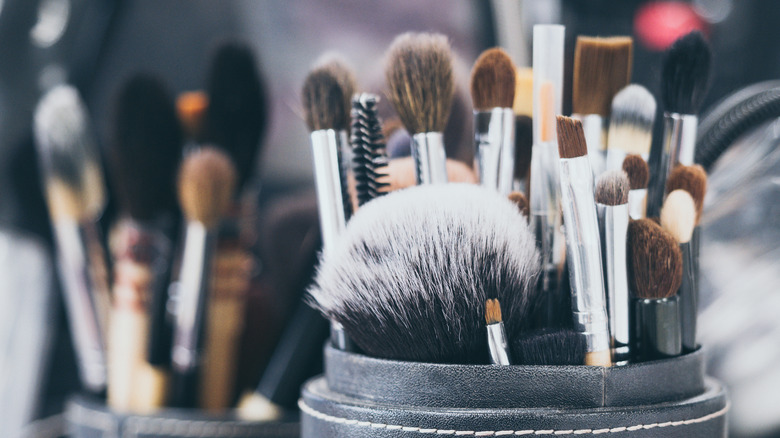 makeup brushes in a holder