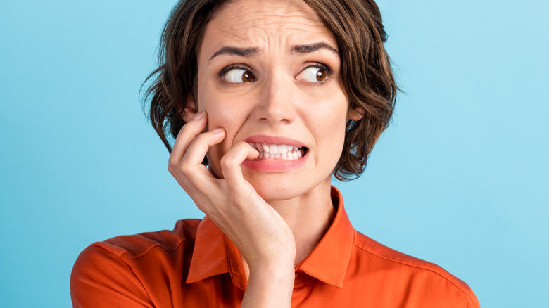 Woman looking nervous