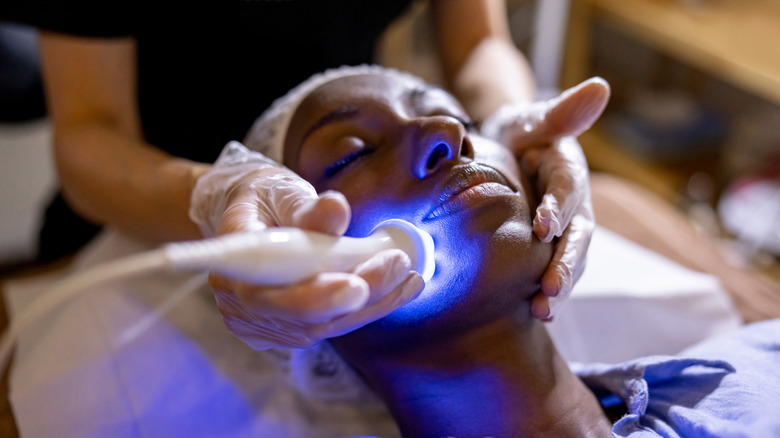 Woman getting skin laser therapy