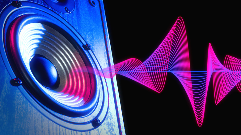 Speaker emitting pink soundwaves