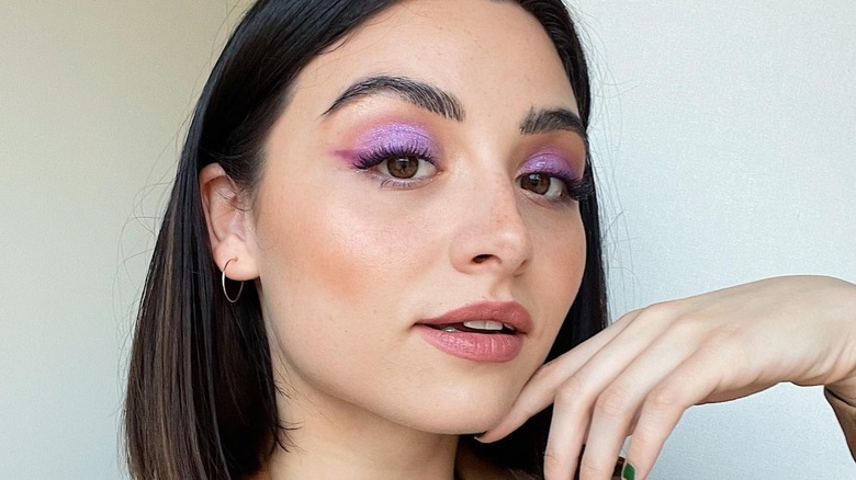 woman with purple eye look