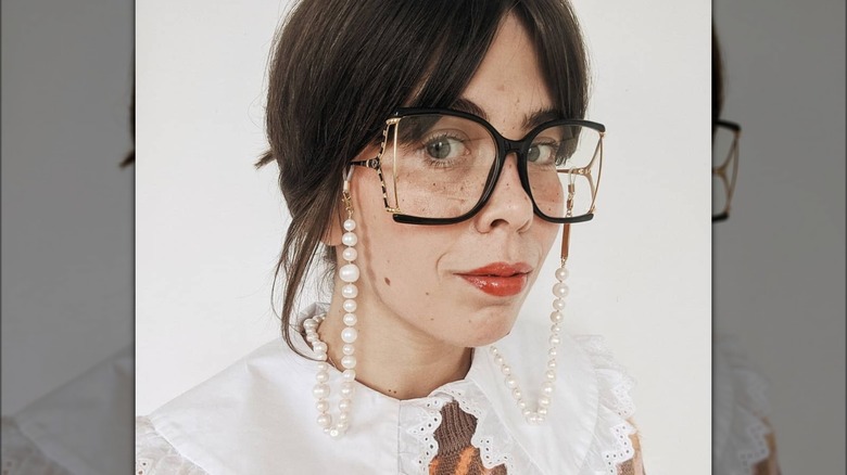 woman wearing eyeglasses with chain