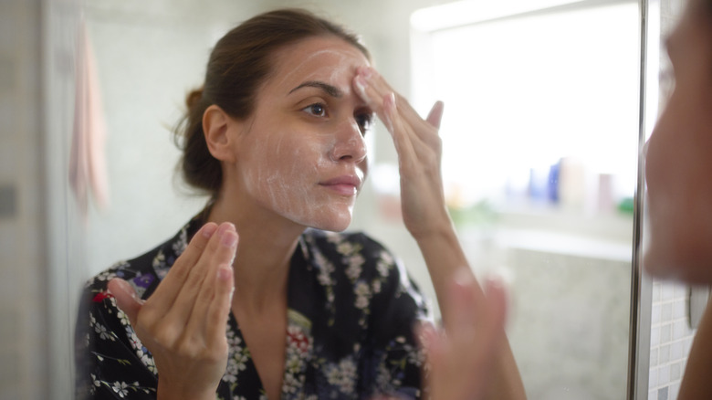 woman washing face