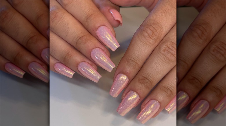 close up on pink shimmer manicure
