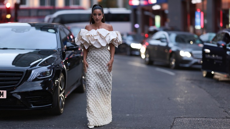 Woman wearing off-the-shoulder dress