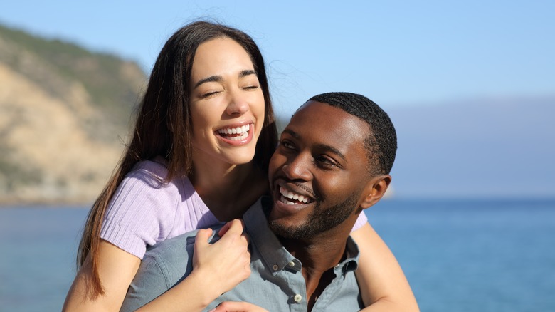 smiling couple on beach