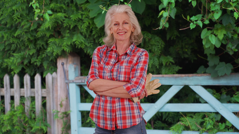 Woman wearing red flannel button-down