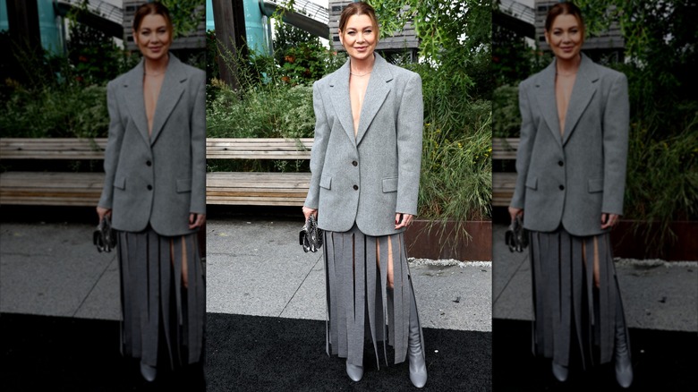 Ellen Pompeo wearing blazer and fringe skirt