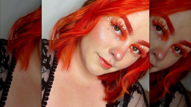 Bright orange lashes and hair