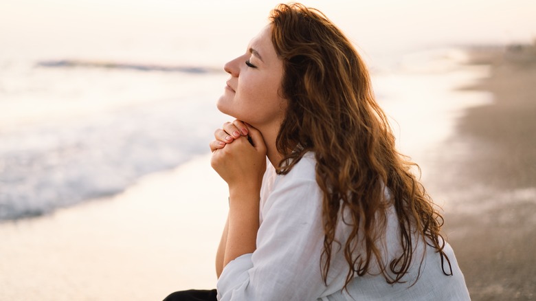 girl sitting on the beach