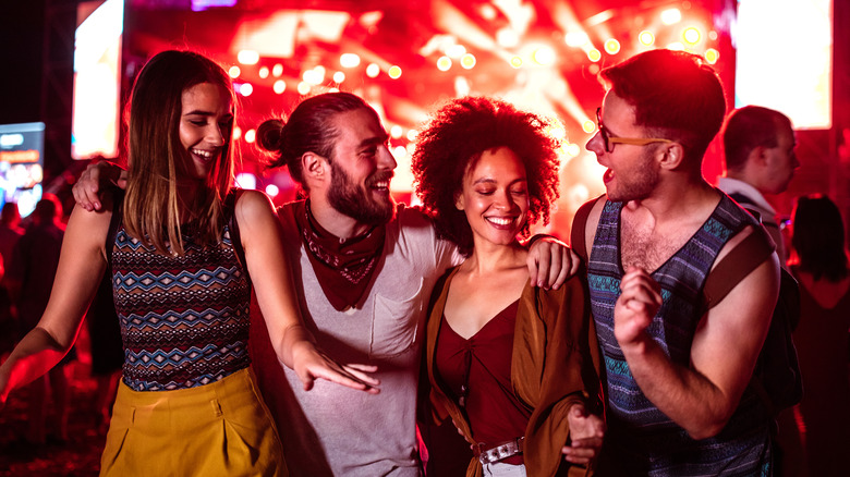 group of friends at concert