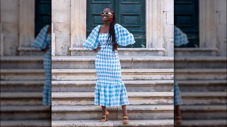 woman in blue gingham dress