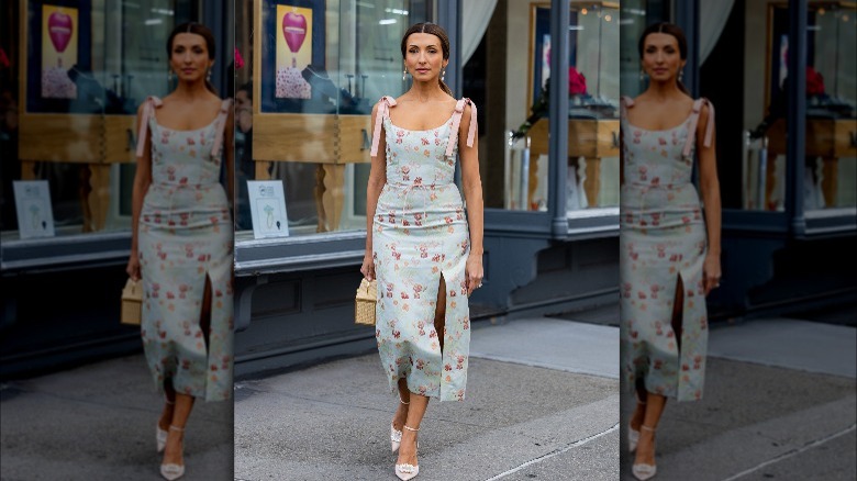 woman in blue floral dress