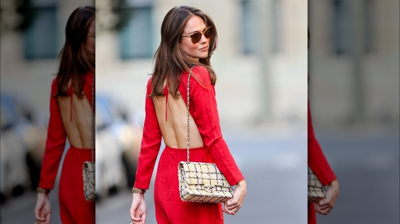 woman in backless red dress