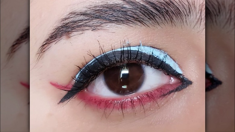 woman with fishtail eyeliner