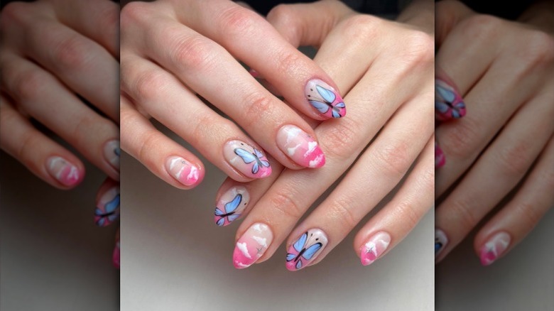 sky and butterfly nails