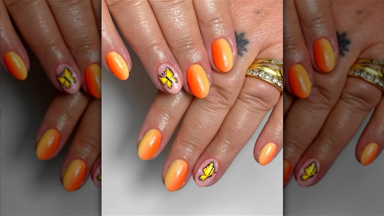 orange and yellow butterfly nails