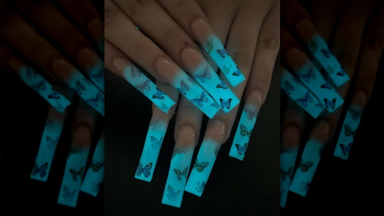 glowing blue butterfly nails