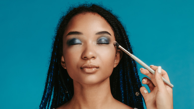 woman with blue eyeshadow on