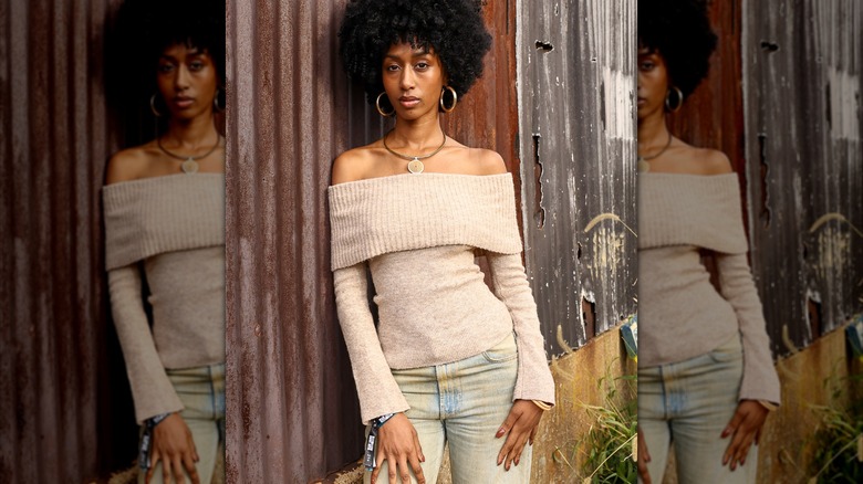 woman in off shoulder sweater