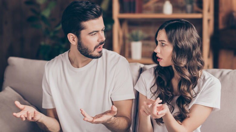 A couple fighting at home