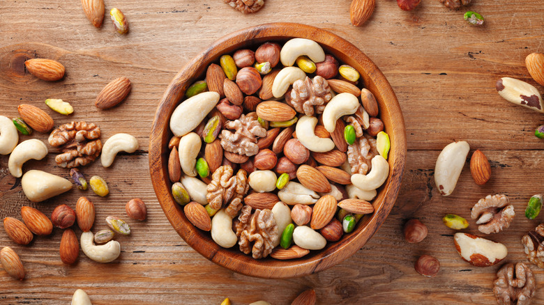 Wooden bowl of mixed nuts and seeds