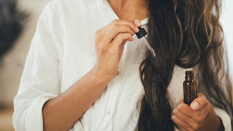 Woman using essential oils 