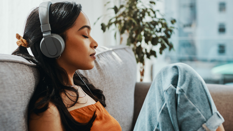 Woman listens to music