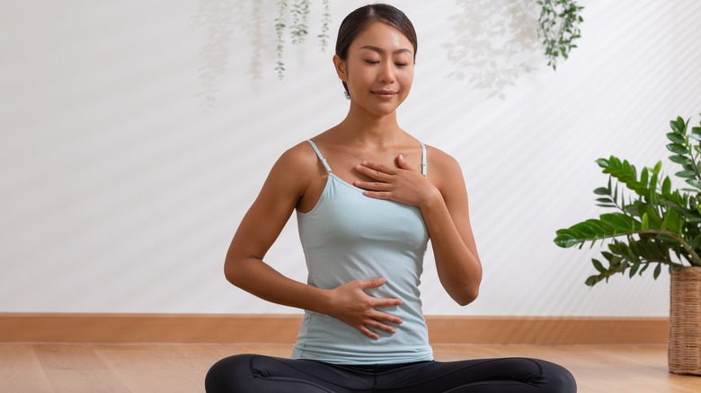 relaxed woman deep breathing