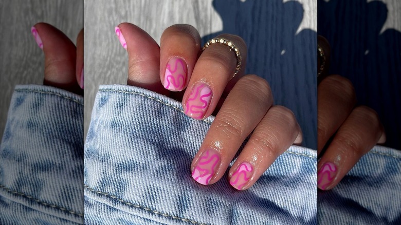 Pastel blue pink swirl manicure