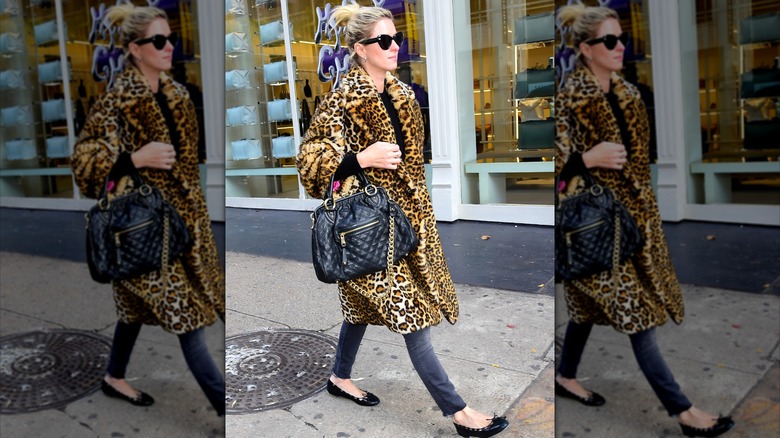 Nicky Hilton Rothschild wearing fuzzy leopard print coat