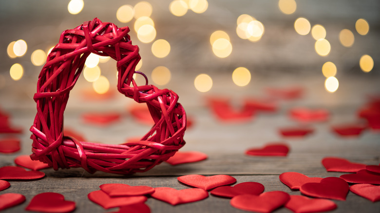 Valentine's day decor with twinkling lights in background