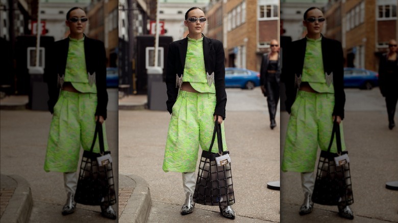 Woman in lime-green gaucho pant and top