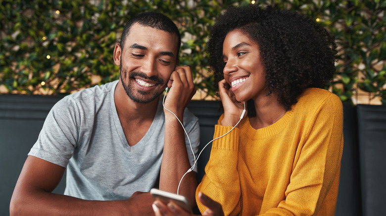 Couple listening to music