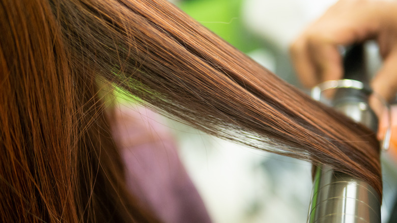 curling ginger hazel hair 